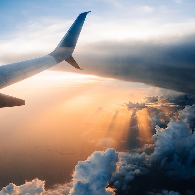 airplane wing and sunset